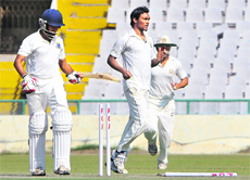 Sandeep Sharma rattles Anustup Majumdar�s timber during the Punjab-Bengal tie.