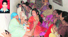 The wailing relatives of Vijay (inset) in Shahkot.