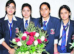Students of MM International school take part in a flower show competition organised by MM University, Mullana