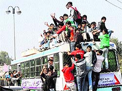 An overloaded private bus on the Rohtak-Bhiwani route