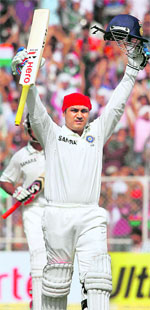 Virender Sehwag hits run-a-ball century (117) in Ahmedabad on Thursday.
