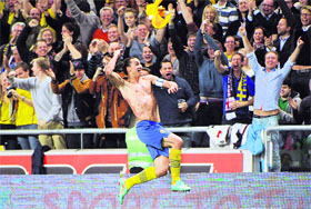Zlatan Ibrahimovic celebrates after Sweden's 4-2 win in the friendly soccer match against England at the Friends Arena in Stockholm.