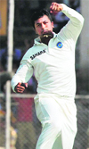 Pragyan Ojha celebrates the dismissal of England's Kevin Pietersen on Day 3 of the first cricket test match at Motera in Ahmedabad on Saturday. � PTI