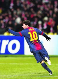 Lionel Messi celebrates after scoring against Spartak Moscow in Moscow on Tuesday