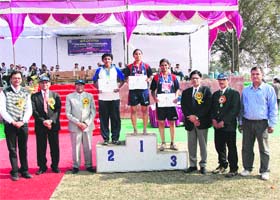 Vice-Chancellor ML Ranga (third from left) poses with winners of an event during the second inter-college athletic meet of Guru Jambheshwar University of Science and Technology at Hisar