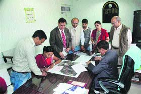 Officials of Haryana Agricultural University and a private agrotech company sign a memorandum of understanding at Hisar