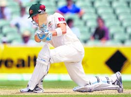 Australian captain Michael Clarke plays a shot during his knock of 38 runs against South Africa in Adelaide on Day Three. 