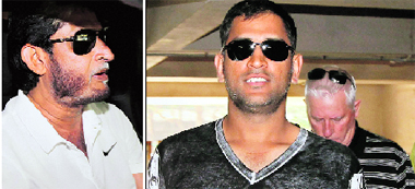 Selection panel head Sandeep Patil (left), skipper MS Dhoni and coach Duncan Fletcher arrive for a meeting to select the team for the third Test in Kolkata on December 5