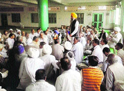 BKU state president Gurnaam Singh Chaduni addresses a joint meeting of BKU, Kisan Sangh, Yamunanagar, and Sugarcane Agitation Committee, Badhson, in Kurukshetra, recently. 