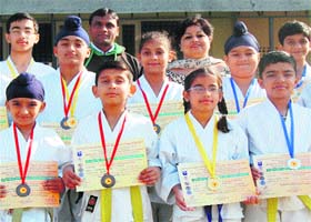 Students of PKR Vatika, Ambla City, who secured gold and silver medals in the North India Karate Championship
