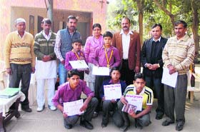Sunita Kadian, Principal, and teachers of Khanpur Kalan school welcome the victorious team in Sonepat recently