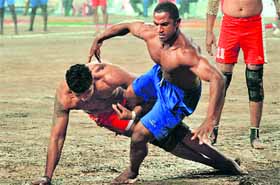 Intense action between Sierra Leone, Italy players during the the third Kabbadi World Cup at Government College Stadium, Gurdaspur.