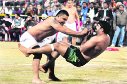 Canada, Pakistan players slug it out in Bathinda. � Tribune photo: Pawan Sharma