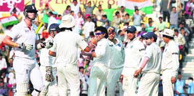 The Indian team celebrates the dismissal of Kevin Pietersen by leftarm spinner Ravindra Jadeja in the second innings on Day 4 of the fourth Test in Nagpur.