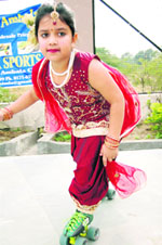 A participant demonstrates skating skills as well as fancy dress-on-skates at a championship organised in Springfield Public School, Ambala City.