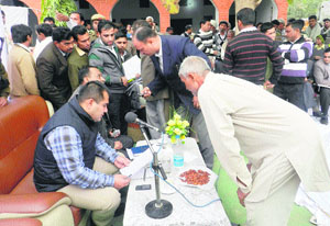 DC Shekhar Vidyarthi during a camp hears a villager�s problems at Banondi village in Ambala district.