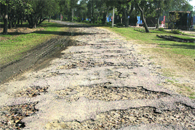 The dilapilated condition of the main road leading to the mini zoo