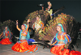 Artistes from Mathura perform at the inauguration of Geeta Jayanti celebrations on the banks of Brahm Sarovar in Kurukshetra.