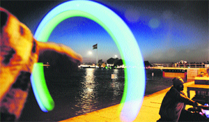 A vendor sells lighting balls in a craft fair on the banks of the Brahamsarovar in Kurukshetra. 