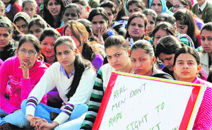 Students of the Emax Group of Institutions stage a protest against the Delhi gang-rape incident in Ambala.