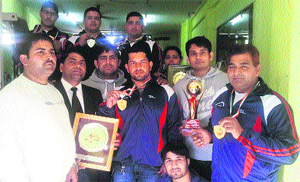 A group photo of the winners of a three-day Open Bench Press Championship at the South Point Education Complex, Sonepat. 