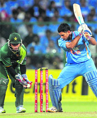 MS Dhoni gets clean bowled during the first T20 match against Pakistan