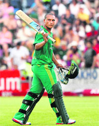Henry Davids acknowledges the crowd after being dismissed by Mitchell McClenaghan, during their Twenty20 match at the Buffalo Park Stadium.