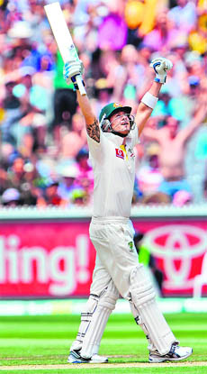 Michael Clarke achieves the Australian record for the most Test runs in a year on the second day at the Melbourne Cricket Ground. 