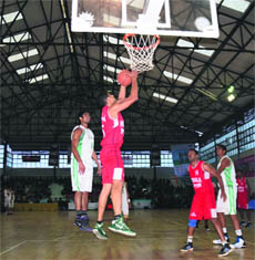  Cagers in action at the Guru Nanak Dev Indoor Stadium on Friday. 