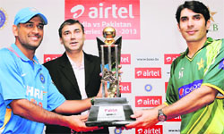 India, Pakistan skipper MS Dhoni (left) and Misbah-ul-Haq pose with the trophy in Chennai on Saturday.