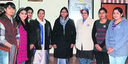 Pooja (right), Manisha (left) and Shushma Joshi (third from right) with the Vice-Chancellor, Dr Pankaj Mittal, and the Registrar, Dr Asha Kadian, on the university premises. Photo by writer