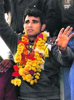 Shami Ahmed is taken out in a procession in his hometown, Amroha, on Monday.