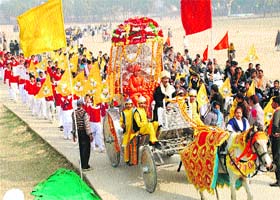 People hold a procession on the 150th birth anniversary of Swami Vivekananda in Kurukshetra