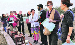 Dr Naresh Bhargav briefs members of a students� delegation of a US university during their visit to BPS Women University, Khanpur Kalan. Photo: BS Malik