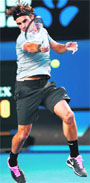Roger Federer creates symphony of movements while beating local star Bernard Tomic 6-4, 7-6 (7/5), 6-1 in Melbourne. � afp 