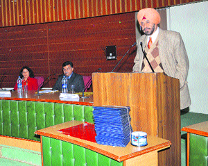 Lt-Gen DDS Sandhu (retd), Vice-Chancellor, Kurukshetra University, addresses participants during a refresher course in business studies in Kurukshetra.