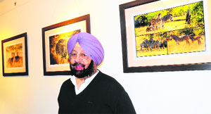 Punjab Pradesh Congress Committee president Capt Amarinder Singh at the Art Folio in Sector 9 in Chandigarh on Friday. 