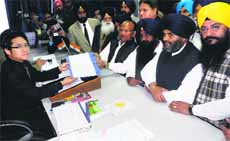 SAD candidate Joginder Pal Jain files his nomination before Additional Deputy Commissioner-cum-Returning Officer Joram Beda in Moga on Saturday.