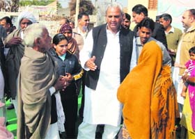 Chief Parliamentary Secretary Prahlad Singh Gillankhera during his village tour in Fatehabad