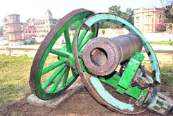 An old canon with damaged wheels, which was once a prized asset of the Patiala royal family, lies in ruins.