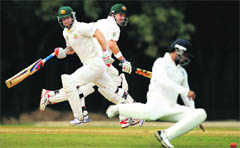 Ed Cowan and Matthew Wade during a two-day practice match against the Board President's XI on Tuesday. � PTI 