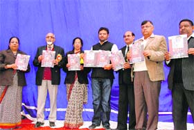 MP Ashok Tanwar (Centre) releases the magazine of SPB DAV School during its annual function at Fatehabad