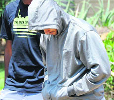 Pistorius leaves the Boschkop police station, Pretoria, en route to appear in court after being charged with murder.