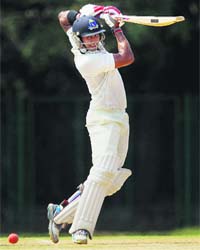 Manoj Tiwari of India-A plays a shot during the second day of three-day practice match against Australia in Chennai on Sunday