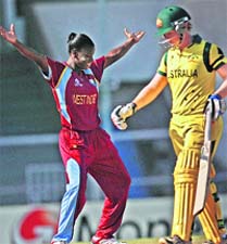 West Indies bowler Tremayne Smartt celebrates the dismisssal of Australian batswoman Alex Blackwell during the final in Mumbai on Sunday