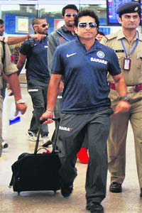 Sachin comes out of Hyderabad airport