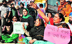 Relatives of Parampreet Kaur, �daughter-in-law� of Patiala ex-Mayor Jaspal Pardhan, hold a protest in Patiala