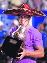 Spain�s Rafael Nadal in Mexican colours after defeating David Ferrer in the final at the Acapulco International tournament in Acapulco