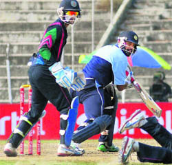 Yusuf Pathan plays one behind the wickets. 