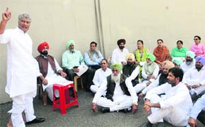 Opposition leader Sunil Jakhar addresses Cong MLAs outside the Punjab Vidhan Sabha in Chandigarh on Wednesday. 